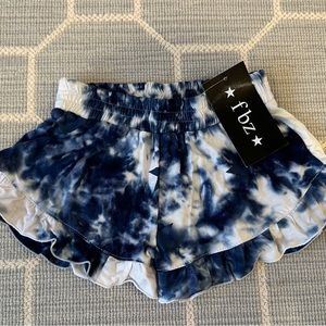 Flowers by Zoe Blue star tie dye ruffle shorts
New with tags
Size 5